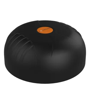 Close-up of a black tire with deep tread and an orange center cap.