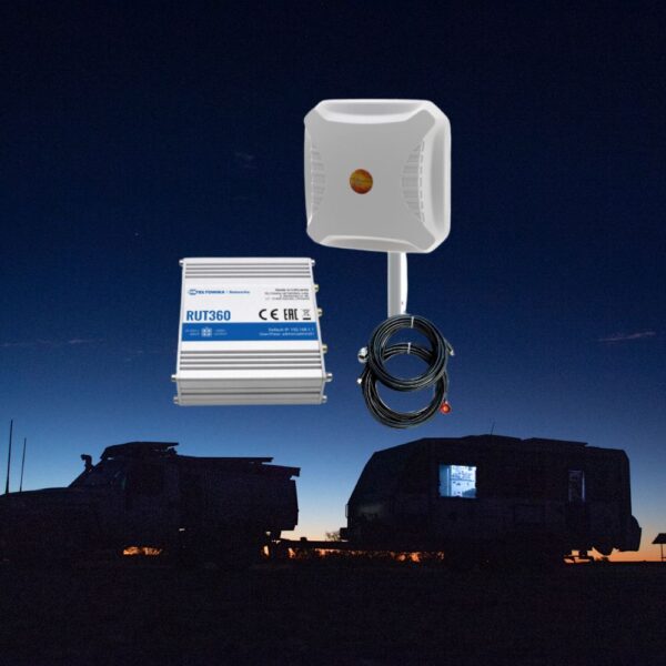 White antenna and silver modem on night time with caravan in the background